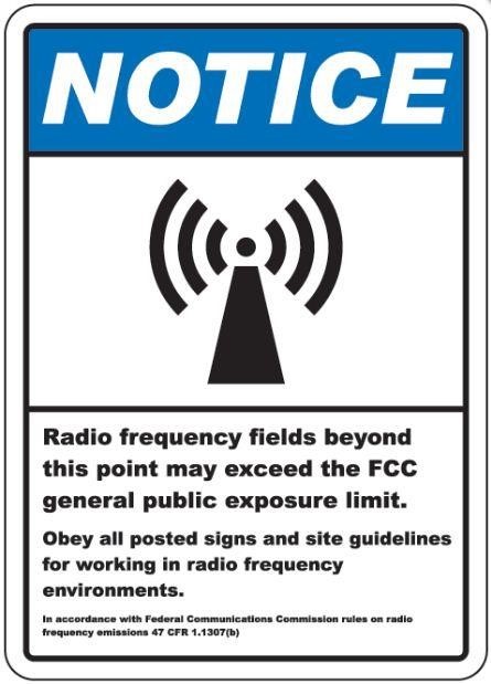 blue and white sign saying Notice radio frequency fields beyond this point may exceed the FCC general public exposure limit