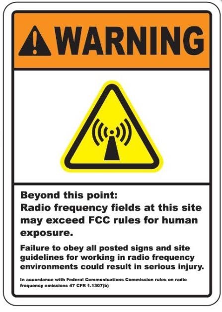 range, yellow and white sign saying Warning beyond this point radio frequency fields at this site may exceed FCC rules for human exposure